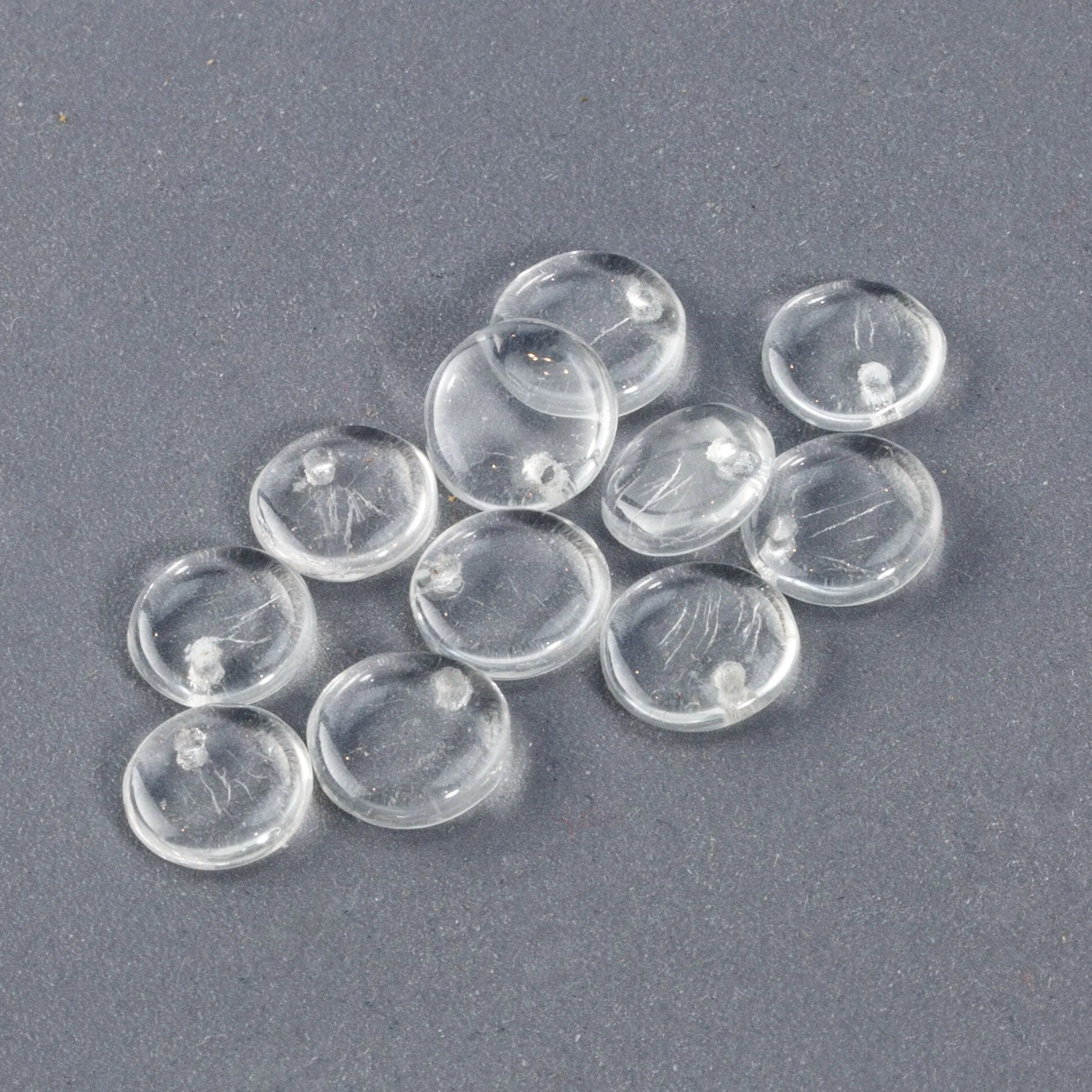 Sequin Pendants Clear Glass. 1920s. Czechoslovakia. 7x2mm. Pkg 50. b11-cr-0505